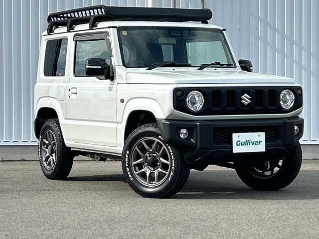スズキ ジムニー XC 愛媛県 2021(令3)年 7.8万km ピュアホワイトP 純正ナビ/Bluetooth/CD/DVD/フルセグ/SD/ETC/クルーズコントロール/ドライブレコーダー前後/バックカメラ/社外テール/４WD/シートヒーター/フォグランプ/純正１６インチAW/ミラーヒーター/レーンキープアシスト/オートLEDヘッドライト/純正フロアマット/スマートキー