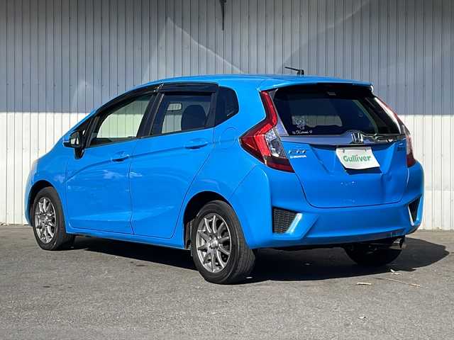 ホンダ フィット ハイブリット Lパッケージ 長野県 2013(平25)年 9.8万km ビビットスカイブルーP 純正ナビ/バックカメラ/ハーフレザーシート/ETC/社外15インチアルミ/ホイール付き冬タイヤ積込/クルーズコントロール/社外マフラー/マフラー積込/取説/スぺアキ―