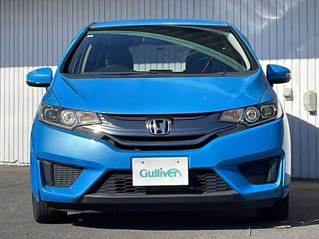 ホンダ フィット ハイブリット Lパッケージ 長野県 2013(平25)年 9.8万km ビビットスカイブルーP 純正ナビ/バックカメラ/ハーフレザーシート/ETC/社外15インチアルミ/ホイール付き冬タイヤ積込/クルーズコントロール/社外マフラー/マフラー積込/取説/スぺアキ―