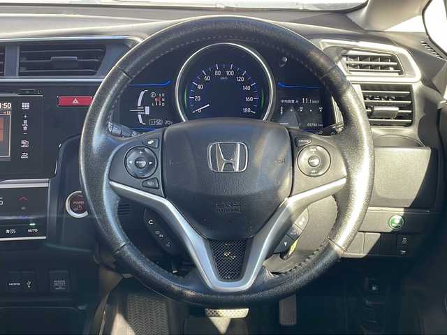 ホンダ フィット ハイブリット Lパッケージ 長野県 2013(平25)年 9.8万km ビビットスカイブルーP 純正ナビ/バックカメラ/ハーフレザーシート/ETC/社外15インチアルミ/ホイール付き冬タイヤ積込/クルーズコントロール/社外マフラー/マフラー積込/取説/スぺアキ―