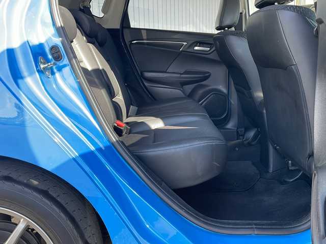 ホンダ フィット ハイブリット Lパッケージ 長野県 2013(平25)年 9.8万km ビビットスカイブルーP 純正ナビ/バックカメラ/ハーフレザーシート/ETC/社外15インチアルミ/ホイール付き冬タイヤ積込/クルーズコントロール/社外マフラー/マフラー積込/取説/スぺアキ―