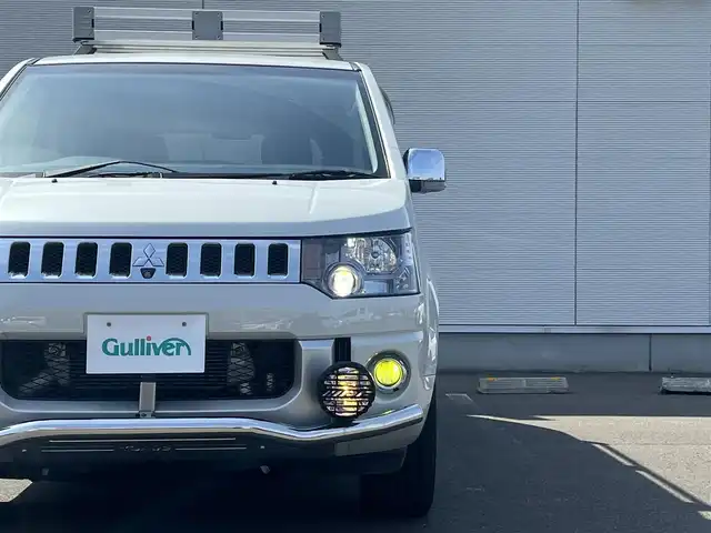 三菱 デリカＤ：５ D－Premium 秋田県 2015(平27)年 7.4万km ウォームホワイトパール 純正ナビ/４WD/両側パワスラ/純正アルミ/D席パワーシート/フルセグ/バックカメラ/スマートキー/前席シートヒーター/クルーズコントロール/フリップダウンモニター/パドルシフト/ルーフラック/スキッドバー/ETC/電動リアゲート/ステアリングスイッチ/社外フロアマット/純正ドアバイザー/オートライト/ダブルオートエアコン/パワーステアリング/パワーウィンドウ/電動格納ミラー/保証書/取扱説明書/記録簿