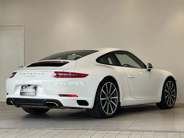 ポルシェ ９１１ カレラ 愛知県 2017(平29)年 3.6万km ピュアホワイト スポクロＰＫＧ　/スポーツステアリング　/ＰＤＬＳヘッドライト　/PASM/電動格納ミラー　/２０インチカレラクラシックＡＷ　/スポーツレザーシート　/シートヒーター　/ＰＣＭナビ　/バックカメラ　/ＥＴＣ　/Ｂｌｕｅｔｏｏｔｈ　/ドライブレコーダー