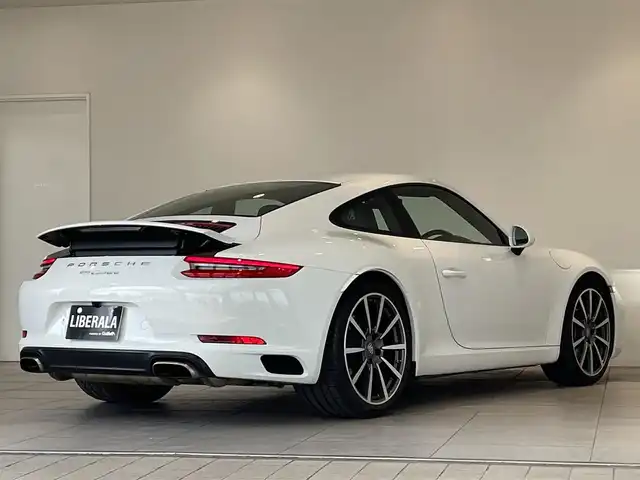 ポルシェ ９１１ カレラ 愛知県 2017(平29)年 3.6万km ピュアホワイト スポクロＰＫＧ　/スポーツステアリング　/ＰＤＬＳヘッドライト　/PASM/電動格納ミラー　/２０インチカレラクラシックＡＷ　/スポーツレザーシート　/シートヒーター　/ＰＣＭナビ　/バックカメラ　/ＥＴＣ　/Ｂｌｕｅｔｏｏｔｈ　/ドライブレコーダー