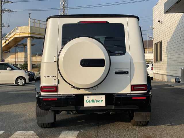 メルセデス・ベンツ ゲレンデヴァーゲン Ｇ４００ｄ マヌファクトゥーアエディション 山口県 2021(令3)年 2.4万km パール 特別仕様車/AMGライン/ラグジュアリーパッケージ/ワンオーナー/純正ナ12.3インチワイドディスプレイナビ/360°カメラ・パークトロニック/Burmestarサラウンドサウンドシステム/サンルーフ/エクスクルーシブナッパレザーシート/グロスブラックＡＭＧマルチスポーク20インチAW/前席シートヒータープラス・前席ベンチレーション・前席リラクゼーション機能付/ドライビングダイナミックシート［前席］/電動ランバーサポート［前席］/本革巻きウッドステアリング/前席／後席シートヒーター/レーダーセーフティパッケージ/アンビエントライト(64色)/ビルトインETC/電動ステップ