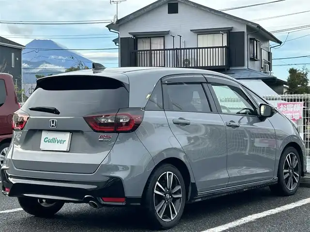 ホンダ フィット e:HEV RS 愛知県 2023(令5)年 3万km グレー 純正ナビ/　【BT/地デジTV/USB】/ホンダセンシング/・衝突軽減ブレーキ/・先行車発信お知らせ/・歩行者事故低減ステアリング/・路外逸脱抑制機能/・標識認識/・アダプティブクルーズコントロール/・車線維持支援/純正LEDヘッドライト/純正16インチAW/バックカメラ/ビルトインETC/パドルシフト/バックカメラ/ビルトインETC2.0/ドライブモードセレクター/電動パーキングブレーキ