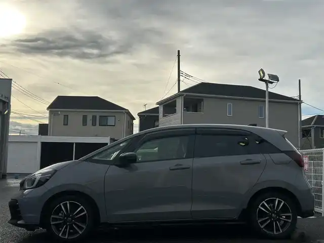 ホンダ フィット e:HEV RS 愛知県 2023(令5)年 3万km グレー 純正ナビ/　【BT/地デジTV/USB】/ホンダセンシング/・衝突軽減ブレーキ/・先行車発信お知らせ/・歩行者事故低減ステアリング/・路外逸脱抑制機能/・標識認識/・アダプティブクルーズコントロール/・車線維持支援/純正LEDヘッドライト/純正16インチAW/バックカメラ/ビルトインETC/パドルシフト/バックカメラ/ビルトインETC2.0/ドライブモードセレクター/電動パーキングブレーキ