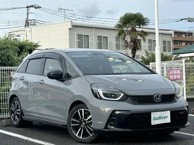 ホンダ フィット e:HEV RS 愛知県 2023(令5)年 3万km グレー 純正ナビ/　【BT/地デジTV/USB】/ホンダセンシング/・衝突軽減ブレーキ/・先行車発信お知らせ/・歩行者事故低減ステアリング/・路外逸脱抑制機能/・標識認識/・アダプティブクルーズコントロール/・車線維持支援/純正LEDヘッドライト/純正16インチAW/バックカメラ/ビルトインETC/パドルシフト/バックカメラ/ビルトインETC2.0/ドライブモードセレクター/電動パーキングブレーキ