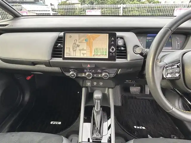 ホンダ フィット e:HEV RS 愛知県 2023(令5)年 3万km グレー 純正ナビ/　【BT/地デジTV/USB】/ホンダセンシング/・衝突軽減ブレーキ/・先行車発信お知らせ/・歩行者事故低減ステアリング/・路外逸脱抑制機能/・標識認識/・アダプティブクルーズコントロール/・車線維持支援/純正LEDヘッドライト/純正16インチAW/バックカメラ/ビルトインETC/パドルシフト/バックカメラ/ビルトインETC2.0/ドライブモードセレクター/電動パーキングブレーキ