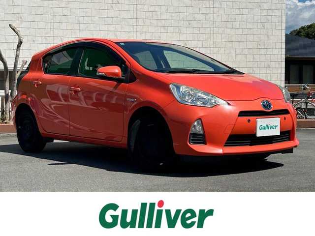 トヨタ アクア G 静岡県 2014(平26)年 3.5万km シトラスオレンジマイカメタリック 社外ＳＤナビ（Ｂｌｕｅｔｏｏｔｈ、ＣＤ、ＤＶＤ、フルセグＴＶ）/バックカメラ/ＥＴＣ/横滑り防止装置/純正フロアマット/オートライト/スマートキー/ドアバイザー/前後コーナーセンサー/ダブルエアバック/横滑り防止装置/プッシュスタート/オートエアコン/キセノンヘッドライト