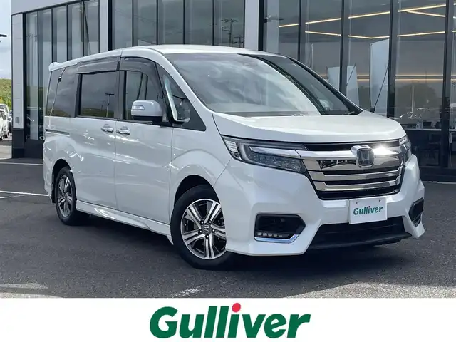 ホンダ ステップワゴン スパーダ eHEV G EXホンダS 新潟県 2021(令3)年 6.2万km プラチナホワイトパール SDナビ/（DTV/DVD/Bluetooth）/寒冷地仕様/衝突軽減/レーンキープアシスト/クルーズコントロール/バックカメラ/ドライブレコーダー/ETC2.0/ハーフレザーシート/シートヒーター/両側パワースライドドア/ロールアップサンシェード/フロアマット/シガソケ/USB電源/LEDヘッドライト/フォグランプ/ウィンカーミラー/電格ミラー/ドアバイザー/スペアキー×１