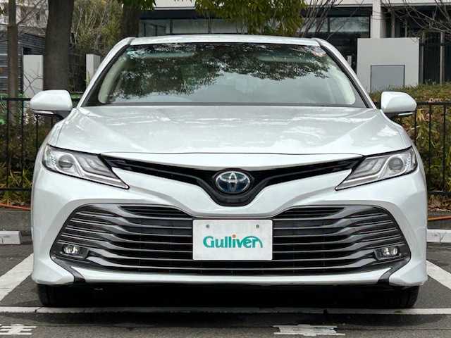 トヨタ カムリ G レザーパッケージ 宮城県 2018(平30)年 6.7万km プラチナホワイトパールマイカ トヨタセーフティセンス/・プリクラッシュセーフティ/・レーダークルーズコントロール/・レーントレーシングアシスト/・オートマチックハイビーム/ヘッドアップディスプレイ/純正ナビ/・バックカメラ/・フルセグTV/Bluetooth/CD/DVD/USB/AUX/・ビルトインETC/・前方ドライブレコーダー/アイドリングストップ/フロント熱線/電子パーキング/・オートブレーキホールド/革巻きステアリング/・ステアリングスイッチ/レザーシート/・パワーシート（運転席/助手席）/・シートヒーター（運転席/助手席）/LEDヘッドライト/・オートライト/・フォグランプ/プッシュスタート/・スマートキー/純正アルミホイール/純正フロアマット/ドアバイザー