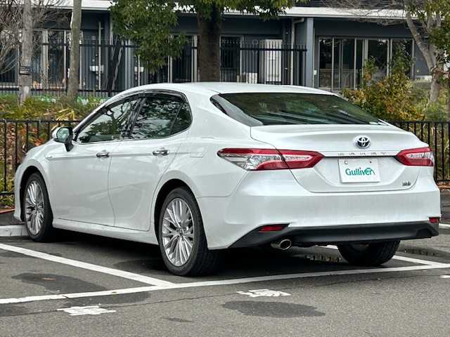 トヨタ カムリ G レザーパッケージ 宮城県 2018(平30)年 6.7万km プラチナホワイトパールマイカ トヨタセーフティセンス/・プリクラッシュセーフティ/・レーダークルーズコントロール/・レーントレーシングアシスト/・オートマチックハイビーム/ヘッドアップディスプレイ/純正ナビ/・バックカメラ/・フルセグTV/Bluetooth/CD/DVD/USB/AUX/・ビルトインETC/・前方ドライブレコーダー/アイドリングストップ/フロント熱線/電子パーキング/・オートブレーキホールド/革巻きステアリング/・ステアリングスイッチ/レザーシート/・パワーシート（運転席/助手席）/・シートヒーター（運転席/助手席）/LEDヘッドライト/・オートライト/・フォグランプ/プッシュスタート/・スマートキー/純正アルミホイール/純正フロアマット/ドアバイザー