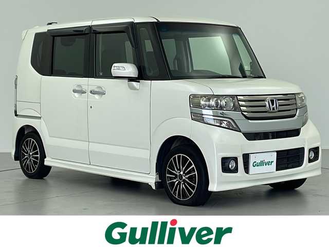 ホンダ Ｎ ＢＯＸ カスタム G 岐阜県 2013(平25)年 10.9万km プレミアムホワイトパール 純正ナビ/AM/FM/TV/SD/CD/DVD/両側スライドドア/ＨＩＤヘッドライト/社外１４インチアルミホイール/ステアリングリモコン/フォグライト/純正ドアバイザー/純正フロアマット/ステアリングリモコン/横滑り防止