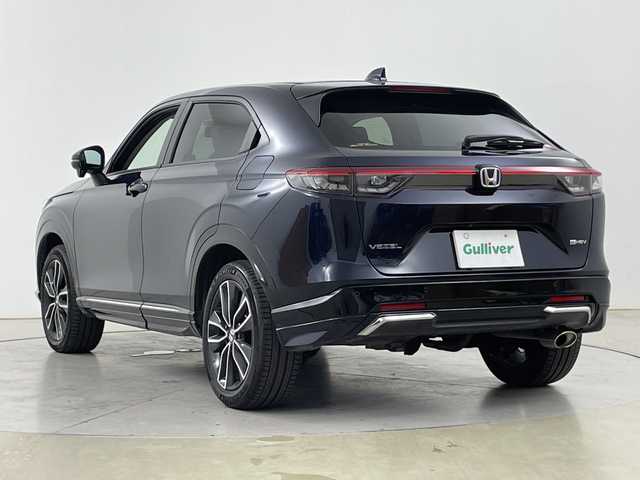 ホンダ ヴェゼル ハイブリッド e:HEV Z 道央・札幌 2024(令6)年 0.6万km ミッドナイトブルービームM ・4WD/・HondaSENSING/・コンフォートビューパッケージ/・純正SDナビ/・BT/DVD/CD/SD/フルセグ/MSV/・USB接続ポート/・バックカメラ/・パワーバックドア/・レーダークルーズコントロール/・ブラインドスポットインフォメーション/・LEDオートライト/オートマチックハイビーム/・フォグランプ/・ハーフレザーシート/シートヒーター/・ダウンヒルアシストコントロール/・純正18インチAW/・スマートキー×2/プッシュスタート/・ETC/・ドライブレコーダー/・社外AWスタッドレスタイヤ積込