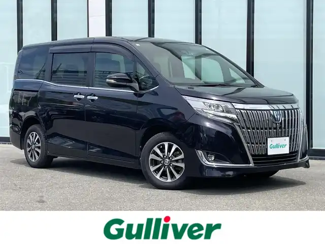 トヨタ エスクァイア ハイブリッド Gi 大阪府 2020(令2)年 6.9万km スパークリングブラックパールクリスタルシャイン ワンオーナー　/純正９インチナビ　/  フルセグTV/CD/DVD/Bluetooth/USB　/バックモニター　/衝突軽減ブレーキ/クリアランスソナー　/１１インチ後席モニター　/前席エアシートヒーター　/両側パワースライドドア　/クルーズコントロール/レーンキープアシスト　/前後ドライブレコーダー/オートマチックハイビーム/純正15インチアルミホイール　/純正フロアマット/プッシュスタート/スマートキー/ビルトインＥＴＣ　/ＬＥＤ