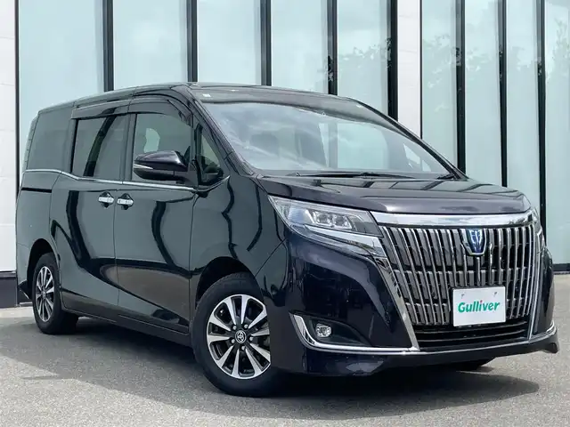トヨタ エスクァイア ハイブリッド Gi 大阪府 2020(令2)年 6.9万km スパークリングブラックパールクリスタルシャイン ワンオーナー　/純正９インチナビ　/  フルセグTV/CD/DVD/Bluetooth/USB　/バックモニター　/衝突軽減ブレーキ/クリアランスソナー　/１１インチ後席モニター　/前席エアシートヒーター　/両側パワースライドドア　/クルーズコントロール/レーンキープアシスト　/前後ドライブレコーダー/オートマチックハイビーム/純正15インチアルミホイール　/純正フロアマット/プッシュスタート/スマートキー/ビルトインＥＴＣ　/ＬＥＤ