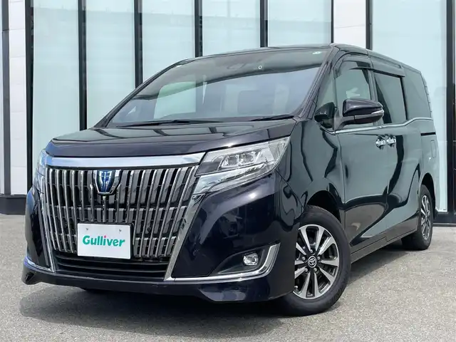 トヨタ エスクァイア ハイブリッド Gi 大阪府 2020(令2)年 6.9万km スパークリングブラックパールクリスタルシャイン ワンオーナー　/純正９インチナビ　/  フルセグTV/CD/DVD/Bluetooth/USB　/バックモニター　/衝突軽減ブレーキ/クリアランスソナー　/１１インチ後席モニター　/前席エアシートヒーター　/両側パワースライドドア　/クルーズコントロール/レーンキープアシスト　/前後ドライブレコーダー/オートマチックハイビーム/純正15インチアルミホイール　/純正フロアマット/プッシュスタート/スマートキー/ビルトインＥＴＣ　/ＬＥＤ