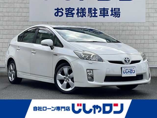 トヨタ プリウス S ツーリングセレクション 山口県 2011(平23)年 10万km ホワイトパールクリスタルシャイン (株)IDOMが運営する【じしゃロン宇部店】の自社ローン専用車両になります。こちらは現金またはオートローンご利用時の価格です。自社ローンご希望の方は別途その旨お申付け下さい/バックカメラ/フルセグＴＶ/純正１７インチＡＷ/純正ナビ/スマートキー