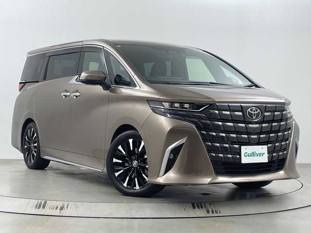 トヨタ アルファードハイブリット エグゼクティブ ラウンジ 埼玉県 2023(令5)年 4.4万km ゴールド ユニバーサルステップ/ＪＢＬサウンド　/左右独立ムーンルーフ　/フリップダウンモニター　/純正ナビ機能付きディスプレイオーディオ/全方位カメラ/前後ドライブレコーダー/ビルトインETC2.0/ブラインドスポットモニター　/ワイヤレス充電器　/ヘッドアップディスプレイ　/レーダークルーズコントロール　/レーンキープアシスト/衝突軽減ブレーキ/ハンドルヒーター/全席エアシート/全席シートヒータ/オットマン/木目調パネル/純正フロアマット/ドアバイザー
