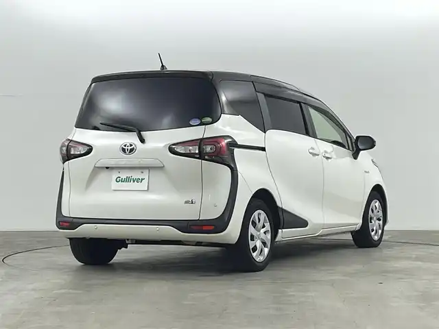 トヨタ シエンタ ハイブリッド G クエロ 福島県 2018(平30)年 4.1万km ヴィンテージブラウンパールクリスタルシャイン/ホワイトパールクリスタルシャイン トヨタセーフティセンス　/・衝突軽減ブレーキ　/・車線逸脱警報装置　/・オートハイビーム　/クリアランスソナー/純正９インチナビゲーション　/・型式：NSZT-Y68T/・TV/BT/CD/DVD/AM・FM/HDMI/・バックカメラ/・ETC/クルーズコントロール/前後ドライブレコーダー/両側パワースライドドア/革巻きステアリング/・ステアリングスイッチ/・ステアリングヒーター/シートヒーター/プッシュスタート/・スマートキー/LEDライト/・フォグライト/・オートライト/フロアマット/純正ドアバイザー/電装格納ミラー