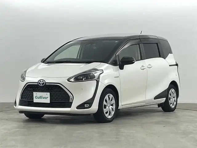 トヨタ シエンタ ハイブリッド G クエロ 福島県 2018(平30)年 4.1万km ヴィンテージブラウンパールクリスタルシャイン/ホワイトパールクリスタルシャイン トヨタセーフティセンス　/・衝突軽減ブレーキ　/・車線逸脱警報装置　/・オートハイビーム　/クリアランスソナー/純正９インチナビゲーション　/・型式：NSZT-Y68T/・TV/BT/CD/DVD/AM・FM/HDMI/・バックカメラ/・ETC/クルーズコントロール/前後ドライブレコーダー/両側パワースライドドア/革巻きステアリング/・ステアリングスイッチ/・ステアリングヒーター/シートヒーター/プッシュスタート/・スマートキー/LEDライト/・フォグライト/・オートライト/フロアマット/純正ドアバイザー/電装格納ミラー