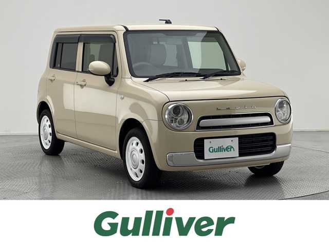スズキ ラパン ショコラ G 兵庫県 2014(平26)年 4.8万km ミルクティーベージュメタリック 社外ナビ/純正フロアマット/バックカメラ/オートライト/プッシュスタート/ETC/アイドリングストップ/パワーウィンドー/パワーステアリング/プッシュスタート/HIDヘッドライト/ドアバイザー/純正ホイールキャップ