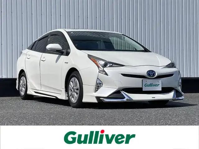 トヨタ プリウス Sセーフティプラス 千葉県 2016(平28)年 7.9万km ホワイトパールクリスタルシャイン 社外メモリナビ/(フルセグTV／BT／CD／DVD／FM／AM)/サンルーフ/バックカメラ/衝突被害軽減システム/車線逸脱警報/クルーズコントロール/レザーシート/横滑り防止装置/ETC/LEDヘッドライト/フォグランプ/オートライト/ウィンカーミラー/電動格納ミラー/シートリフター/プッシュスタート/スマートキー/フロアマット/ドアバイザー