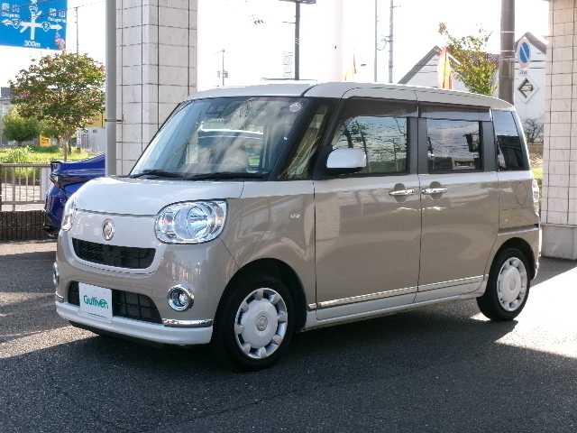 ダイハツ ムーヴ キャンバス X メイクアップ リミテッド SAⅢ 宮崎県 2018(平30)年 6.1万km パールホワイトⅢ/ナチュラルベージュマイカメタリック 2トーン 【 Smart Assist III 】/・衝突回避支援ブレーキ機能/・衝突警報機能（対車両・対歩行者）/・車線逸脱警報機能/・誤発進抑制制御機能/・先行車発進お知らせ機能/・コーナーセンサー（前方・後方）/・オートハイビーム/純正SDナビ/フルセグテレビ/パノラマモニター/フロント・サイド・バックカメラ/Bluetooth/USB/HDMI/DVD再生可能/両側パワースライドドア/ドライブレコーダー/オートライト/ETC/ドライブレコーダー/オートライト/スマートキー2個/純正フロアマット