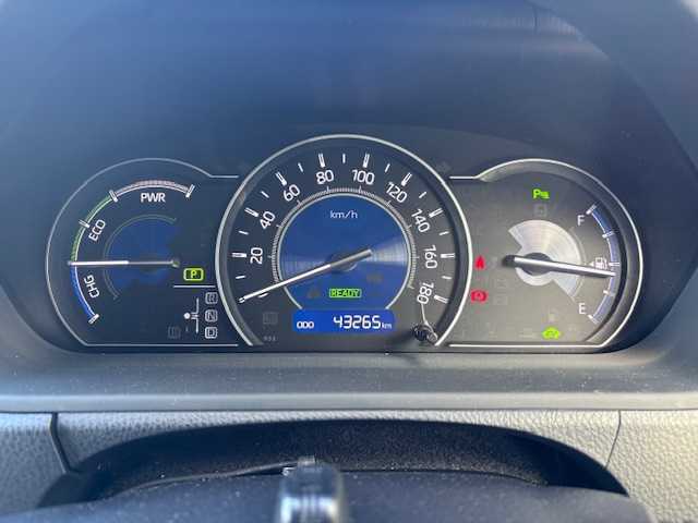 トヨタ ヴォクシー ハイブリッド ZS 煌Ⅲ 大阪府 2021(令3)年 4.4万km イナズマスパーキングブラックガラスフレーク 純正9インチナビ(BT/フルセグ/DVD)/バックカメラ/フリップダウンモニター/衝突被害軽減システム/クルーズコントロール/レーンキープアシスト/コーナーセンサー/両側パワースライドドア/ハーフレザーシート/シートヒーター/ETC/LEDヘッドライト/オートライト/オートマチックハイビーム/ドライブレコーダー/社外フロアマット/社外アルミホイール/スペアキー