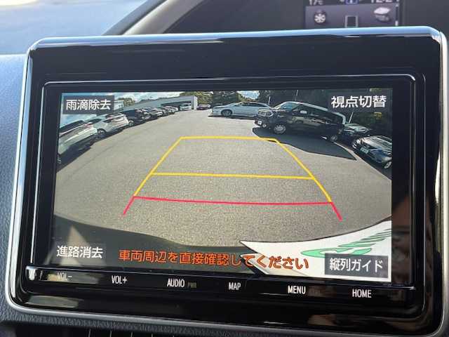 トヨタ ヴォクシー ハイブリッド ZS 煌Ⅲ 大阪府 2021(令3)年 4.4万km イナズマスパーキングブラックガラスフレーク 純正9インチナビ(BT/フルセグ/DVD)/バックカメラ/フリップダウンモニター/衝突被害軽減システム/クルーズコントロール/レーンキープアシスト/コーナーセンサー/両側パワースライドドア/ハーフレザーシート/シートヒーター/ETC/LEDヘッドライト/オートライト/オートマチックハイビーム/ドライブレコーダー/社外フロアマット/社外アルミホイール/スペアキー