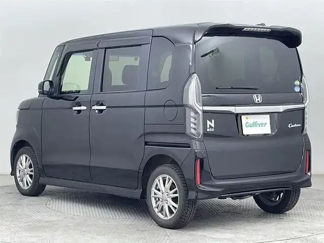ホンダ Ｎ ＢＯＸ カスタム G L ホンダセンシング 道央・札幌 2019(平31)年 1.5万km クリスタルブラックパール ・ワンオーナー/・４WD/・純正メモリーナビゲーション（VXM-194VFi）/・片側パワースライドドア/・ホンダセンシング/・衝突軽減ブレーキ/・ロードサインアシスト/・先行車発進通知/・横滑り防止装置/・レーンキープアシスト/・レーダ－クルーズコントロール/・後方パーキングソナー/・ビルトインＥＴＣ/・バックカメラ/・社外前方録画ドライブレコーダー/・純正フロアマット/・前席シートヒーター/・LEDヘッドライト/・オートライト/・フロントフォグランプ/・スマートキー/・プッシュスタート/・スペアキー１本/・社外ＡＷ14インチ/・純正ＡＷ14インチ夏タイヤ積込/・保証書あり/・取説あり