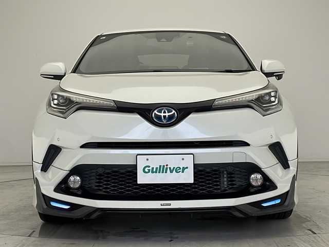 トヨタ Ｃ－ＨＲ G 愛知県 2017(平29)年 9.7万km ホワイトパールクリスタルシャイン 衝突被害軽減ブレーキ/純正9インチSD（ナビなし）/モデリスタエアロパーツ/レーダークルーズコントロール/シートヒーター/フルセグTV/CD DVD/Bluetooth/バックカメラ/コーナーセンサー/純正アルミホイール/ブラインドスポットモニター/LEDヘッドライト/オートマチックハイビーム/ドライブレコーダー/ETC/ステアリングスイッチ/スマートキー/プッシュスタート