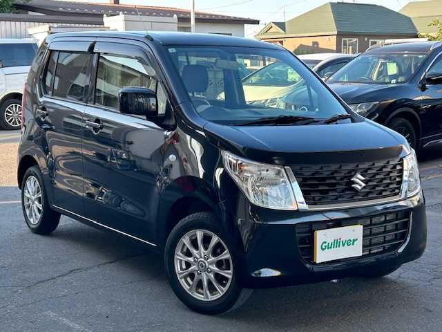 スズキ ワゴンＲ FX 道東・釧路十勝 2016(平28)年 3.3万km ブルーイッシュブラックパール3 4WD/純正CDオーディオ/リモコンキー/シートヒーター/アイドリングストップ/ETC/ヘッドライトレベライザー/電動格納ミラー/純正フロアマット/純正ドアバイザー/スペアキー/取扱説明書/冬タイヤ積み込み/  (155/65/R14、2mm、純正CP)