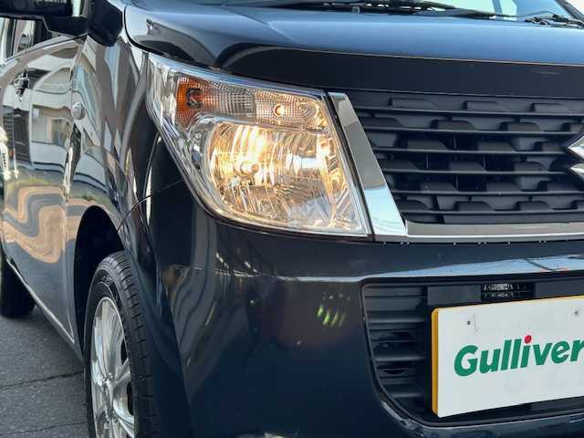 スズキ ワゴンＲ FX 道東・釧路十勝 2016(平28)年 3.3万km ブルーイッシュブラックパール3 4WD/純正CDオーディオ/リモコンキー/シートヒーター/アイドリングストップ/ETC/ヘッドライトレベライザー/電動格納ミラー/純正フロアマット/純正ドアバイザー/スペアキー/取扱説明書/冬タイヤ積み込み/  (155/65/R14、2mm、純正CP)