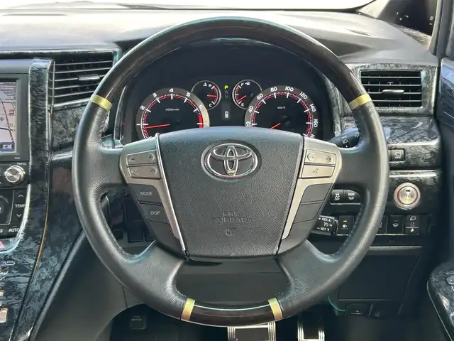 トヨタ ヴェルファイア 2．4Z ゴールデンアイズⅡ 山形県 2014(平26)年 11.1万km ブラック ４WD/純正ナビ/フルセグTV/FM/AM/DVD/HDD/Bluetooth/横ブレ防止装置/両側パワースライドア/シートカーバー/プッシュスタート/フリップダウンモニター/ETC/クルーズコントロール/スマートキー/ダブルエアバックサイド/AUTOライト/フォグランプ/カーテンエアバック/取扱説明書