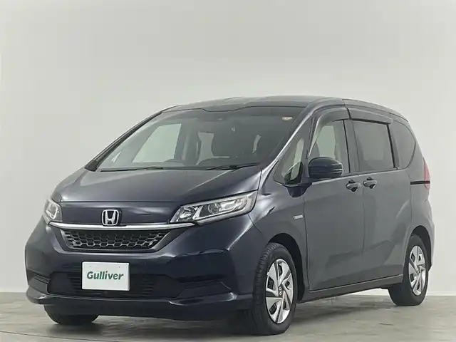 ホンダ フリード ハイブリット G ホンダセンシング 埼玉県 2021(令3)年 3.6万km ミッドナイトブルービームM 純正９型ナビ　１１．６型後席モニター　両側電動スライドドア　シートヒーター　バックカメラ　ＥＴＣ　追従走行　フルセグＴＶ　スマートキー　CD/DVD　Bluetooth　純正フロアマット　衝突被害軽減