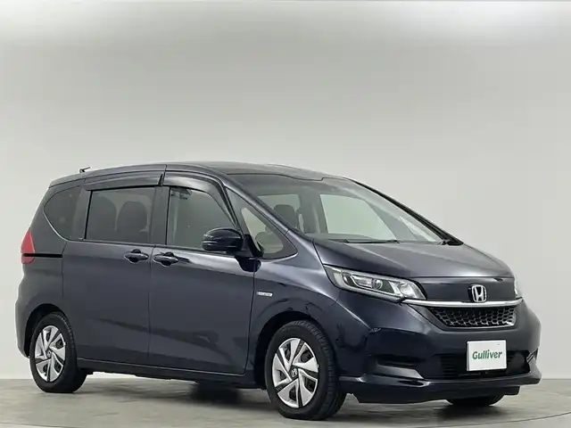 ホンダ フリード ハイブリット G ホンダセンシング 埼玉県 2021(令3)年 3.6万km ミッドナイトブルービームM 純正９型ナビ　１１．６型後席モニター　両側電動スライドドア　シートヒーター　バックカメラ　ＥＴＣ　追従走行　フルセグＴＶ　スマートキー　CD/DVD　Bluetooth　純正フロアマット　衝突被害軽減