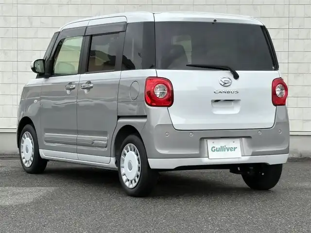 ダイハツ ムーヴ キャンバス ストライプス G 山口県 2023(令5)年 2.1万km シャイニングホワイトパール/スムーズグレーマイカメタリック 純正ナビ/9インチスマホ連携デイスプレイオーディオ/BT/HDMI/フルセグTV/両側パワースライド/前方ドライブレコーダー/衝突軽減ブレーキ/コーナーセンサー/フォグランプ/オートライト/オートホールド/保温機能付きカップホルダー/電動格納ミラー/純正フロアマット