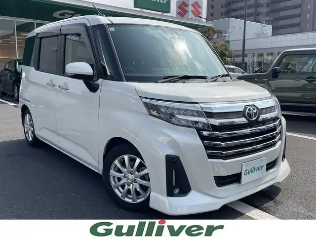 トヨタ ルーミー カスタムG 島根県 2021(令3)年 3.2万km パールホワイトⅢ ４ＷＤ　/純正９型ナビ・フルセグTV/  ＣＤ／ＤＶＤ再生／ＢＴ／ＨＤＭＩ　/バックカメラ　/両側パワスラ　/ビルトインＥＴＣ　/前ドラレコ　/レーダークルコン　/衝突軽減ブレーキ　/コーナーセンサー　/ＬＥＤヘッドライト/アイドリングストップ/電子パーキングブレーキ/オートブレーキホールド/純正フロアマット/ドアバイザー