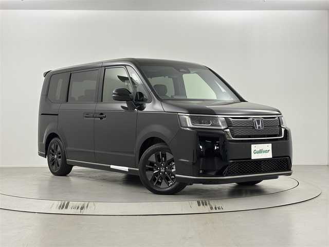 ホンダ ステップワゴン スパーダ eHEV 埼玉県 2025(令7)年 0.1万km未満 クリスタルブラックパール 純正ナビ（BT/AM/FM）/フルセグTV/パドルシフト/レーダークルーズコントロール/バックカメラ/横滑り防止装置/レーンキープアシスト/盗難防止装置/衝突軽減システム/コーナーセンサー/LEDヘッドライト/両側パワースライドドア/パワーバックドア/スマートキー/プッシュスタート
