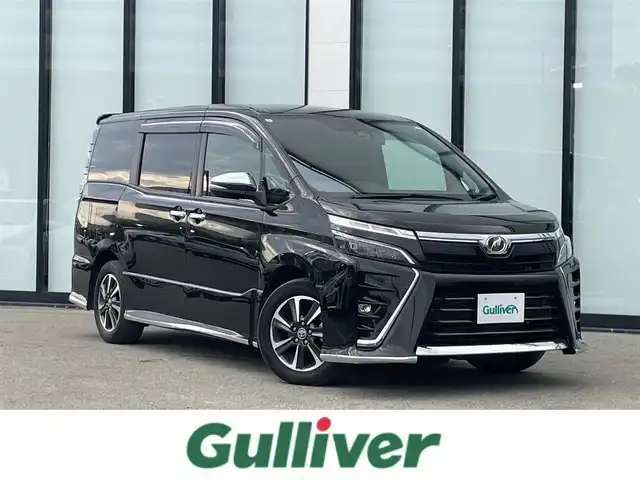 トヨタ ヴォクシー ZS 煌Ⅱ 大阪府 2019(令1)年 3.4万km ブラック 純正９インチナビ/   フルセグTV/CD/DVD/Bluetooth/USB/バックモニター/１２インチ後席モニター/衝突軽減ブレーキ/横滑り防止装置/アイドリングストップ/両側パワースライドドア/クルーズコントロール/レーンキープアシスト/前後ドライブレコーダー/オートマチックハイビーム/純正16インチアルミホイール/純正フロアマット/プッシュスタート/スマートキー/ＥＴＣ/ＬＥＤライト/禁煙車