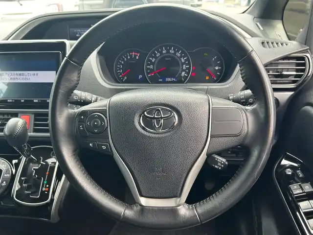 トヨタ ヴォクシー ZS 煌Ⅱ 大阪府 2019(令1)年 3.4万km ブラック 純正９インチナビ/   フルセグTV/CD/DVD/Bluetooth/USB/バックモニター/１２インチ後席モニター/衝突軽減ブレーキ/横滑り防止装置/アイドリングストップ/両側パワースライドドア/クルーズコントロール/レーンキープアシスト/前後ドライブレコーダー/オートマチックハイビーム/純正16インチアルミホイール/純正フロアマット/プッシュスタート/スマートキー/ＥＴＣ/ＬＥＤライト/禁煙車