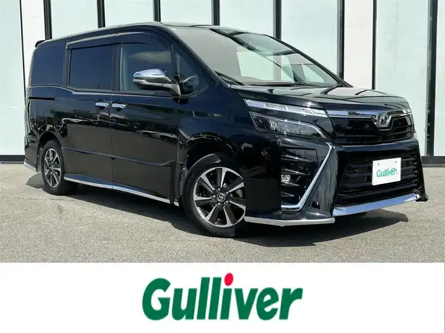 トヨタ ヴォクシー ZS 煌Ⅱ 大阪府 2019(令1)年 3.4万km ブラック 純正９インチナビ/   フルセグTV/CD/DVD/Bluetooth/USB/バックモニター/１２インチ後席モニター/衝突軽減ブレーキ/横滑り防止装置/アイドリングストップ/両側パワースライドドア/クルーズコントロール/レーンキープアシスト/前後ドライブレコーダー/オートマチックハイビーム/純正16インチアルミホイール/純正フロアマット/プッシュスタート/スマートキー/ＥＴＣ/ＬＥＤライト/禁煙車