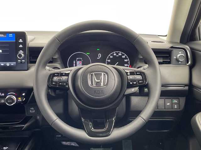ホンダ ヴェゼル ハイブリッド e:HEV Z 栃木県 2025(令7)年 0.1千km クリスタルブラックパール 純正9インチホンダコネクトディスプレイナビ/(フルセグTV・Bluetooth)/バックカメラ/フロントグリル(メーカーオプション)　ベルリナブラック/ホンダセンシング/ ・衝突軽減システム/ ・車線維持システム/ ・アダプティブクルーズコントロール/ ・オートハイビーム/ ・アダプティブクルーズコントロール/前後コーナーセンサー/置くだけ充電/純正ビルトインETC2.0/ハーフレザーシート/シートヒーター/パワーバックドア/純正アルミホイール/スマートキー/プッシュスタート
