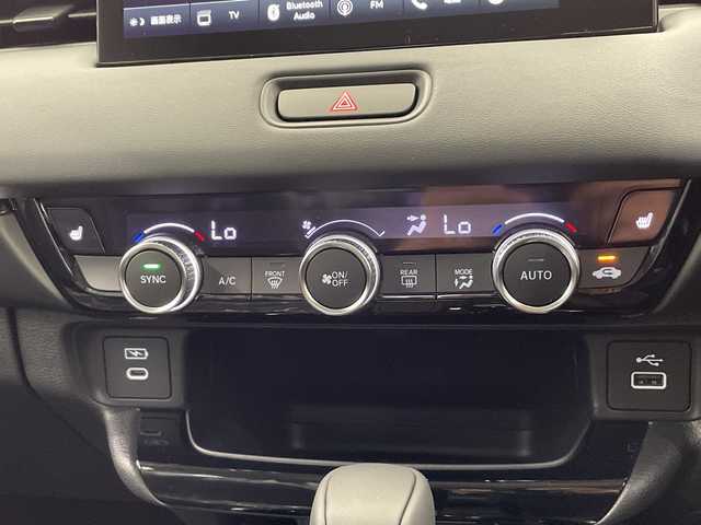 ホンダ ヴェゼル ハイブリッド e:HEV Z 栃木県 2025(令7)年 0.1千km クリスタルブラックパール 純正9インチホンダコネクトディスプレイナビ/(フルセグTV・Bluetooth)/バックカメラ/フロントグリル(メーカーオプション)　ベルリナブラック/ホンダセンシング/ ・衝突軽減システム/ ・車線維持システム/ ・アダプティブクルーズコントロール/ ・オートハイビーム/ ・アダプティブクルーズコントロール/前後コーナーセンサー/置くだけ充電/純正ビルトインETC2.0/ハーフレザーシート/シートヒーター/パワーバックドア/純正アルミホイール/スマートキー/プッシュスタート