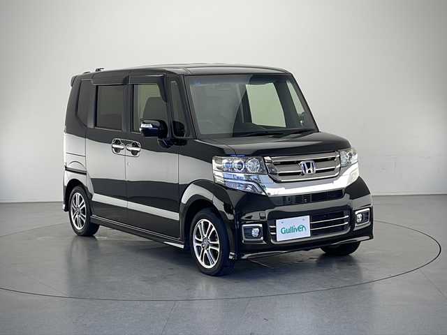 ホンダ Ｎ ＢＯＸ カスタム G SSパッケージ 長野県 2017(平29)年 2.7万km クリスタルブラックパール 純正SDナビ　(VXM-185VFEi)/（フルセグテレビ＆SD＆CD＆Bluetooth）/バックカメラ/両側パワースライドドア/前席シートヒーター/ビルトインETC/チップアップシート/オートエアコン/シートカバー調/ステアリングスイッチ/ドリンクホルダー/後席サンシェード/オートライト/純正フロアマット/１４インチ純正アルミホイール/スマートキー