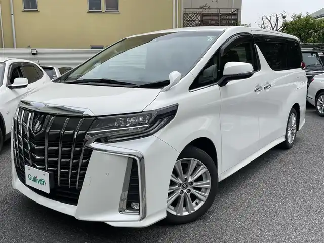トヨタ アルファード S 東京都 2022(令4)年 1.4万km ホワイトパールクリスタルシャイン セーフティセンス（予防安全パッケージ）詳細は検査員記入欄参照/ワンオーナー/保証書・取説・ナビ取説/Egプッシュスタートキー・スマートキー×2/MTモード付AT/アイドリングストップ/2列目リラックスキャプテンシート・オットマン/純正９インチディスプレイナビ/BT/USB/AppleCarPlay/AndroidAuto/バックカメラ・パーキングサポート/純正ビルトイン2.0ETC/純正フロントドラレコ/両側ワンタッチパワースライドドア（イージークロージャー付）・バックドアイージークロージャー/純正１８インチアルミ/ブラック加飾2眼ェDヘッドライト・LEDフォグ・オートライト/革巻きステア・ステアスイッチ/AUTOHOLD/AV100V電源