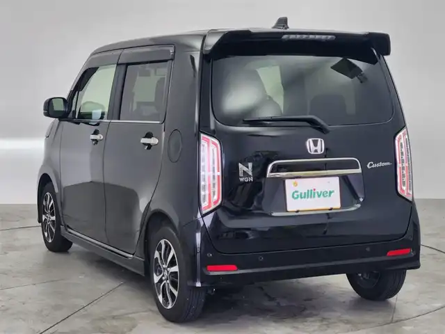 ホンダ Ｎ ＷＧＮ カスタム L 愛知県 2024(令6)年 1.6万km クリスタルブラックパール 純正9インチプレミアムインターナビ/　　・CD/DVD/BT/applecarplay/USBポート/フルセグTV/バックカメラ/ドライブレコーダー（前後）/ビルトインETC/本革巻ステアリングリモコン/レザーシート/シートヒーター（前席）/純正フロアマット/純正14インチアルミホイール/テールゲートスポイラー/ホンダセンシング/　　・衝突軽減ブレーキ/　　・誤発信抑制機能/　　・誤後方発進抑制機能/　　・路外逸脱抑制機能/　　・アダプティブクルーズコントロール/　　・車線維持システム/　　・先行車発進お知らせ機能/　　・標識認識機能/　　・オートハイビーム/　　・パーキングセンサーシステム/LEDヘッドライト/フォグランプ/シーケンシャルランプ/デイライト/取扱説明書/保証書/スペアキー