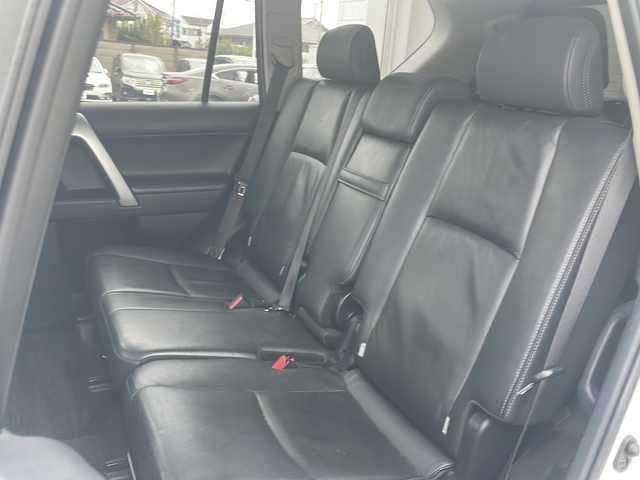 トヨタ ランドクルーザー プラド TZ－G 栃木県 2015(平27)年 7.9万km ホワイトパールクリスタルシャイン ワンオーナー/純正SDナビ/・NSZT-W64/・Bluetooth CD DVD/・TV フルセグ/バックカメラ/電動ガラスサンルーフ/ALPINE 後部モニター　PKH-M900SV/ドアバイザー/クルーズコントロール/スペアスマートキー/パワーシート/レザーシート/シートヒーター/前後ドライブレコーダー/ETC/MYRTLE 18インチアルミホイール/コーナーセンサー/ダウンヒルアシストコントロール/LEDヘッドライト/オートライト/保証書/取扱説明書/記録簿